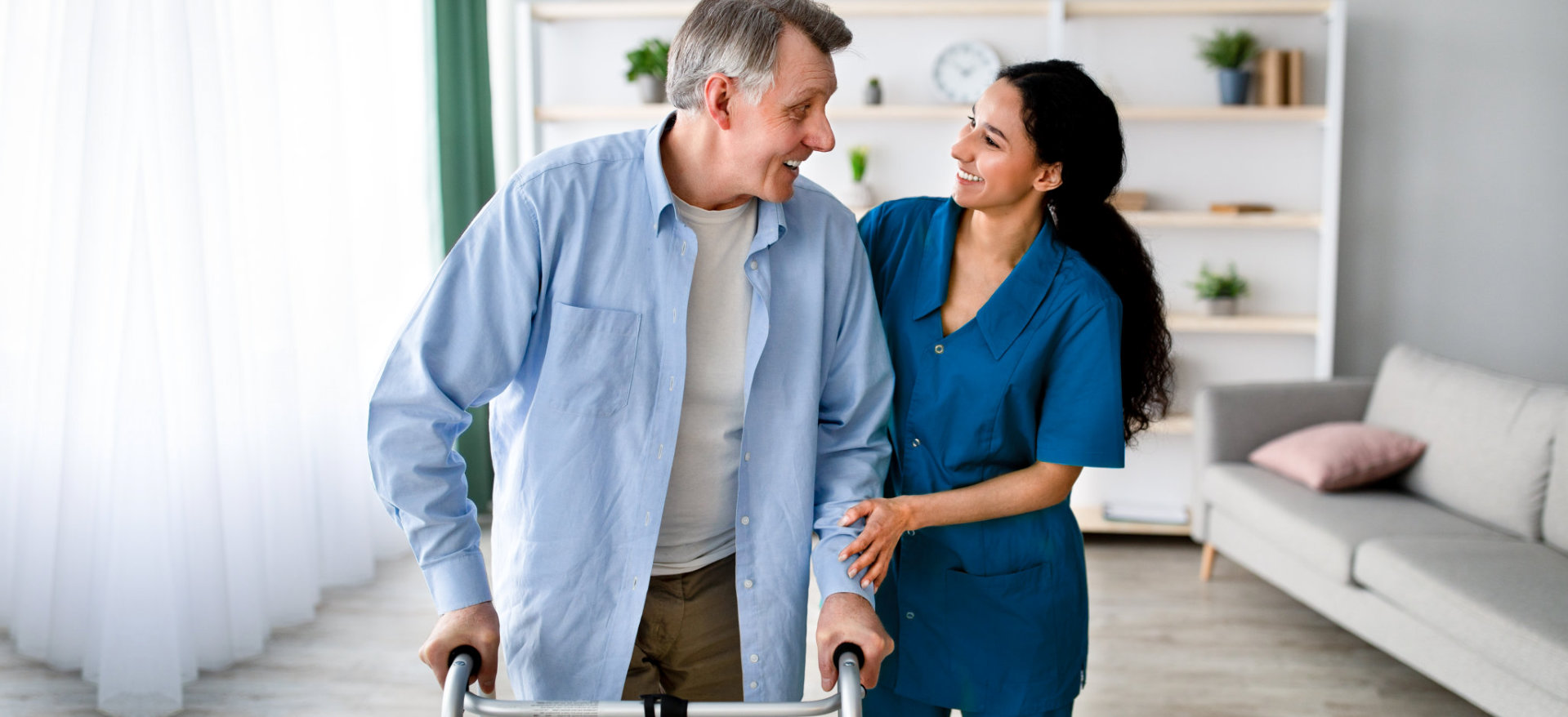 lady caregiver assisting the male patient